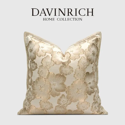 A cream cushion cover with embossed floral gold pattern crafted from luxurious satin for living room decorbites decor
