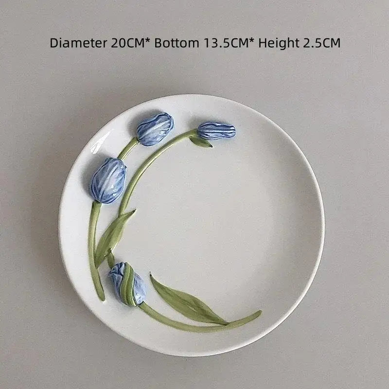 White ceramic plate with decorbites 3d embossed blue tulips and green stems from embossed tulip ceramic cup set