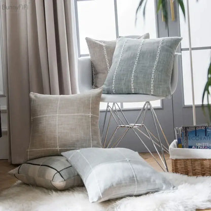 Beige and light gray linen throw pillows with subtle woven patterns featuring decorbites brown grey stripe embroidery for living room decor