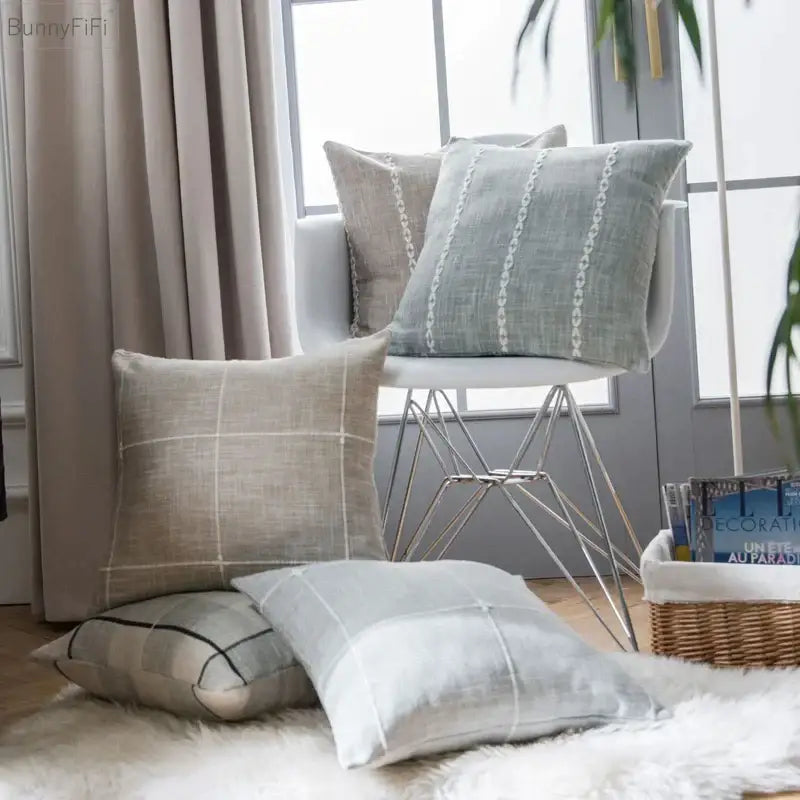 Beige and light gray linen throw pillows with subtle woven patterns featuring decorbites brown grey stripe embroidery for living room decor