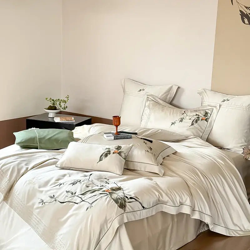 Cream-colored embroidered lyocell cotton bedding set with floral design enhancing bedroom decorbites deluxe lyocell luxury decor
