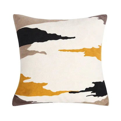 Embroidered cushion cover set featuring a square cushion with an abstract cloud-like pattern in neutral tones