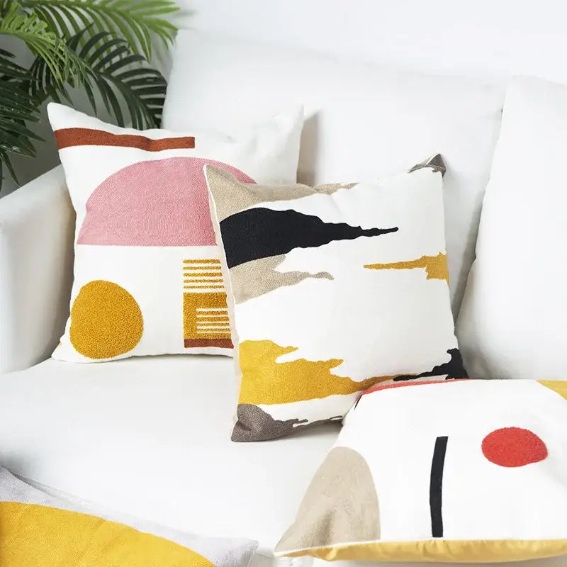 Embroidered cushion cover set of four white cushion covers with abstract pink yellow black and beige geometric designs for living room decor
