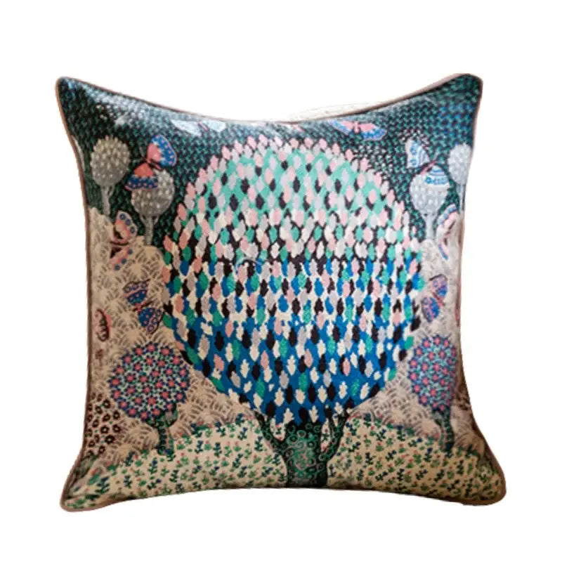 Square embroidered elephant jungle paradise throw pillow with vibrant teal, blue, pink tree on textured beige decorbites elephant jungle design