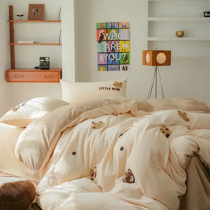 Cream-colored embroidered fleece winter bedding set with plush duvet and teddy bear design pillowcases