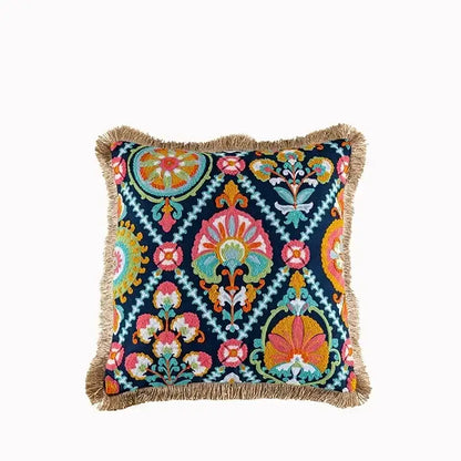 Vibrant embroidered flower boho long cushion cover with navy base floral and geometric patterns framed by natural fringe