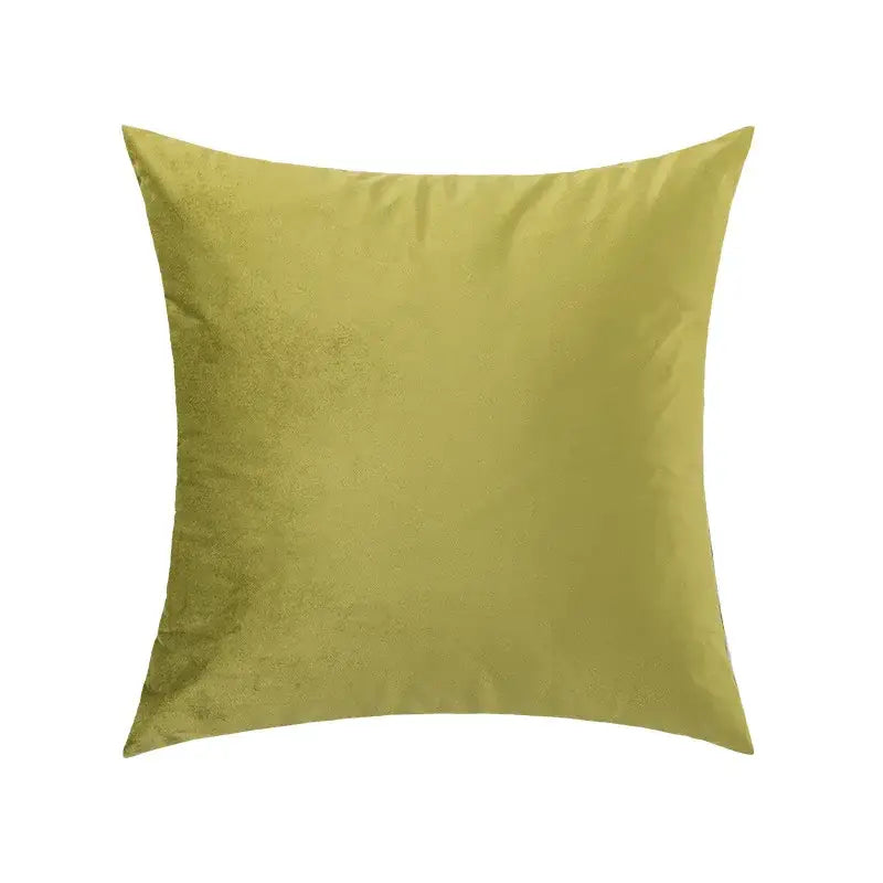 Square olive-green velvet throw pillow with plush texture as an embroidered flower pillowcase cover for living room decor