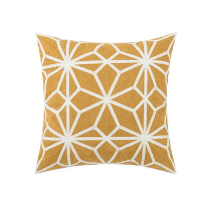 Square throw pillow cover with mustard yellow base and white yellow floral geometric embroidery for living room use