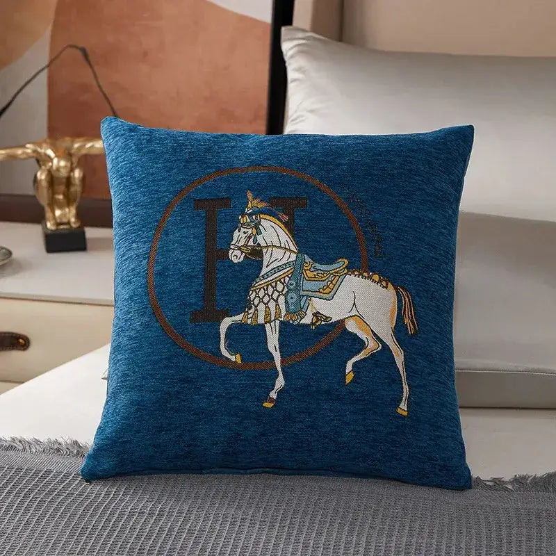 Blue cotton cushion cover featuring an embroidered white horse with ornate blue and gold tack within an h emblem for decorbites throw pillow decor
