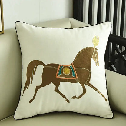 Cream-colored embroidered horse pillowcase with brown horse and golden flame detail for living room decor