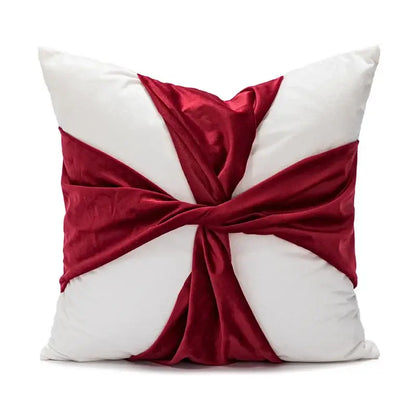 White cushion with burgundy velvet ribbon tied in cross knot for decorbites cartoon christmas pillow covers