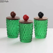 Three emerald green diamond glass storage jars with walnut lids and decorbites ceramic ball knobs for kitchen decor