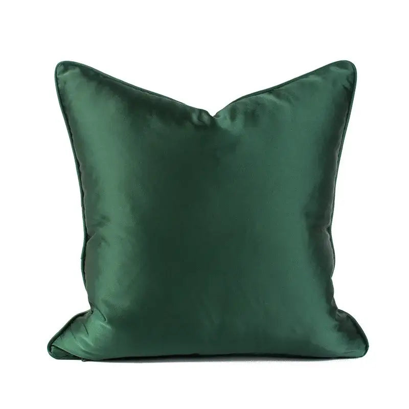 Deep emerald green geo cushion cover with smooth satin finish and structured square shape for living room pillows