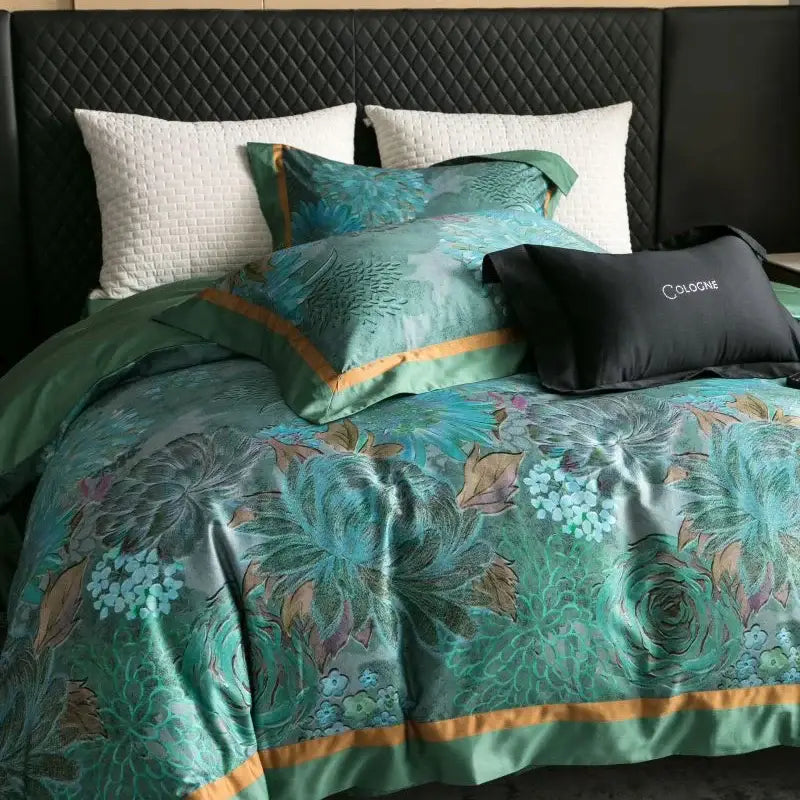 Emerald green and gold egyptian cotton bedding set featuring teal floral satin duvet cover with embroidered botanical patterns