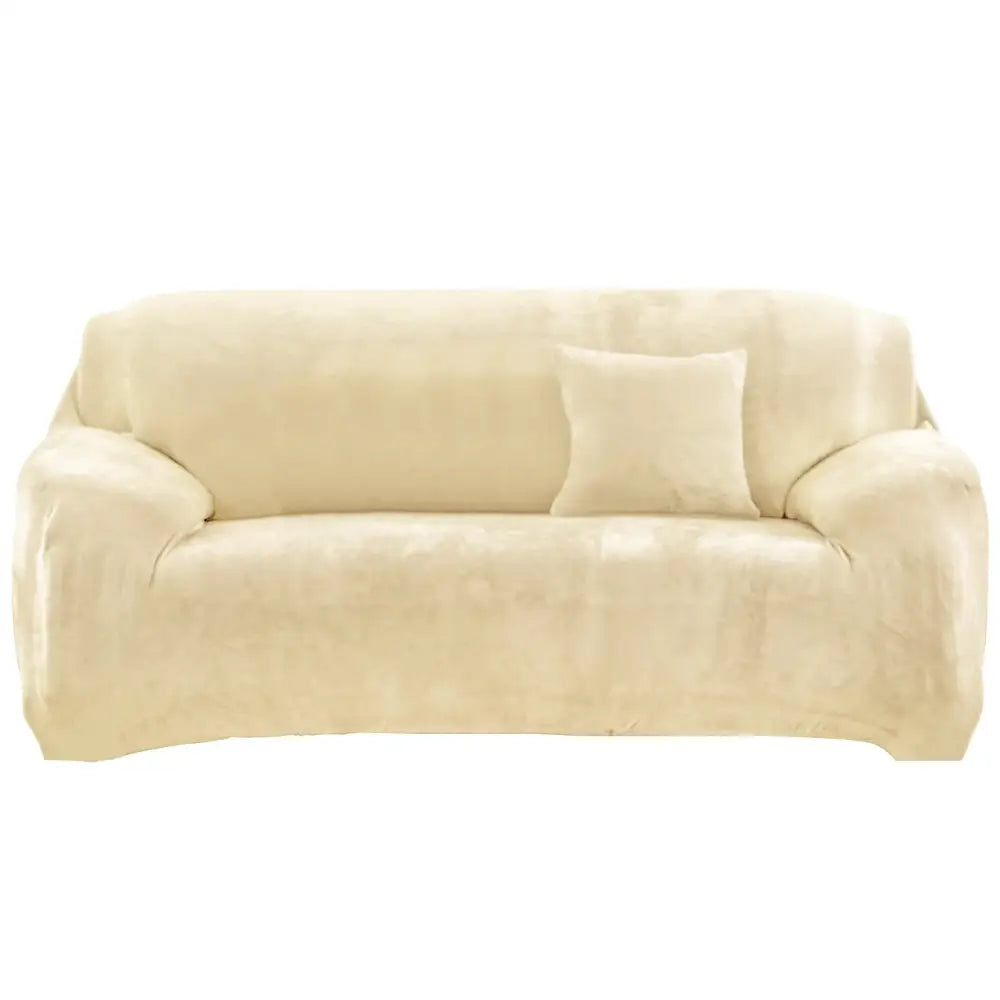 Cream-colored plush fabric sofa cover with matching square pillow for emerald green velvet living room slipcover