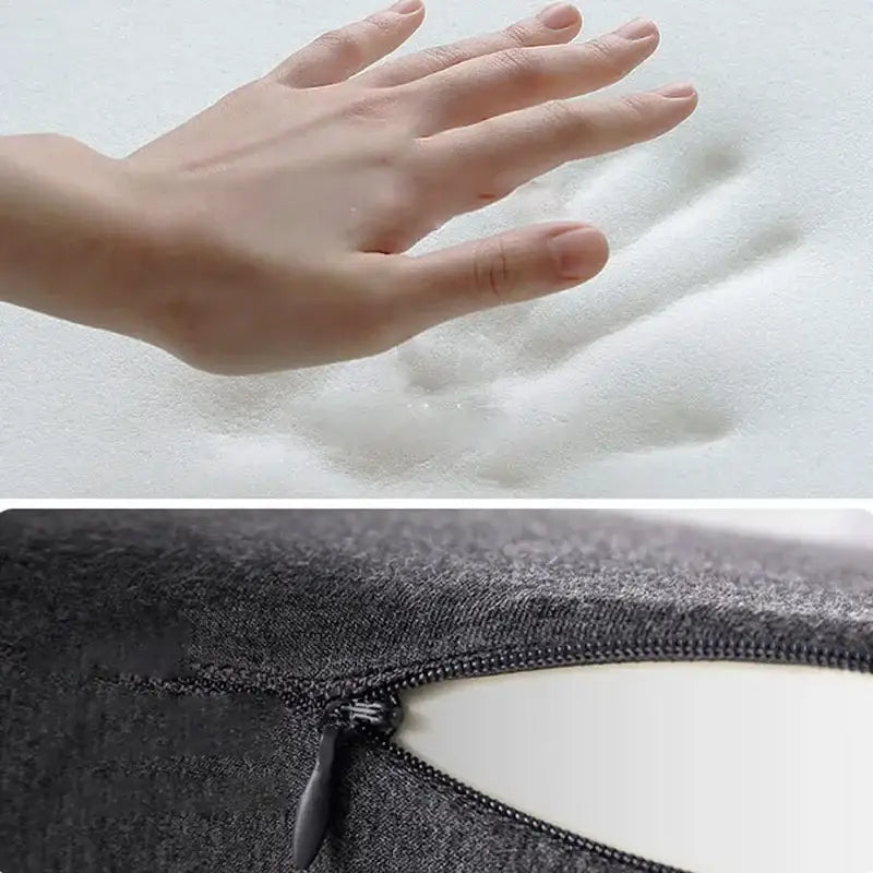Ergonomic gray butterfly memory foam pillow with white foam and dark gray fabric cover featuring zipper closure for neck support