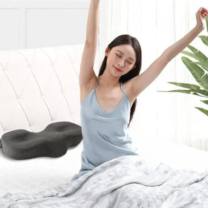 Dark gray decorbites butterfly memory foam cervical pillow with contoured shape and textured surface for neck support