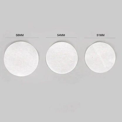 Three circular white paper espresso coffee filter papers in 58mm 54mm and 51mm by decorbites kitchen accessory pack