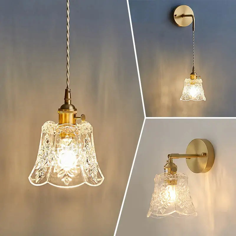 Clear glass pendant light and wall sconce with intricate floral etching and polished copper metal fixtures for dining room