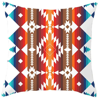 Ethnic bohemian geometric pillow cover with vibrant red orange brown and teal stripes featuring white diamond shapes decorbites