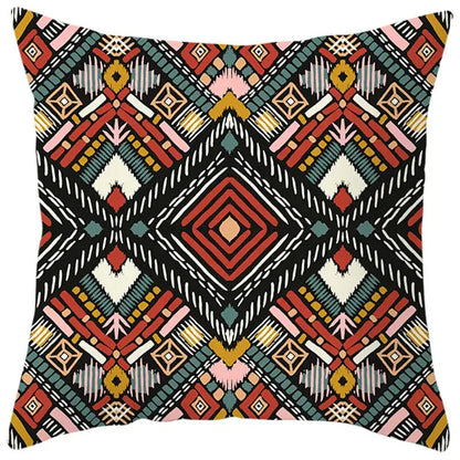 Ethnic bohemian geometric pillow cover with vibrant red teal cream patterns on black for living room decorbites decor