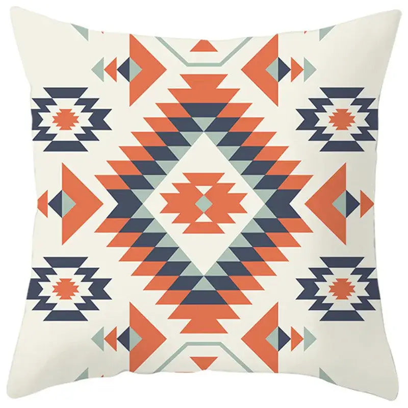 Cream-colored pillow cover with bold orange navy blue and gray ethnic bohemian geometric pattern for living room decor