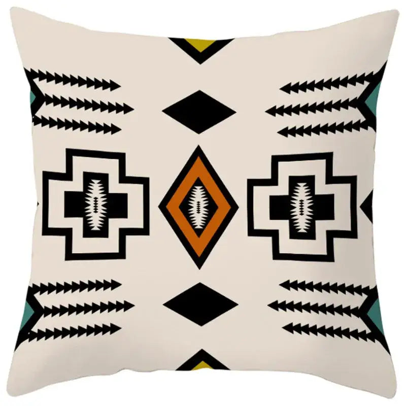 Cream-colored pillow cover with bold black orange and teal ethnic bohemian geometric pattern for living room decorbites decor