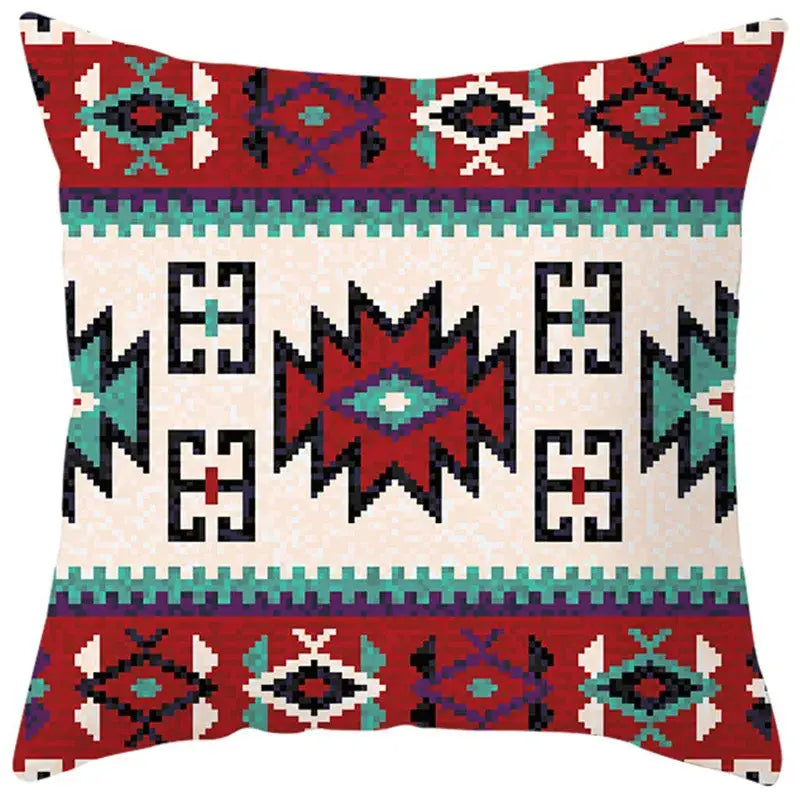 A square throw pillow cover with a bold red teal black cream ethnic bohemian geometric pattern for living room decorbites decor