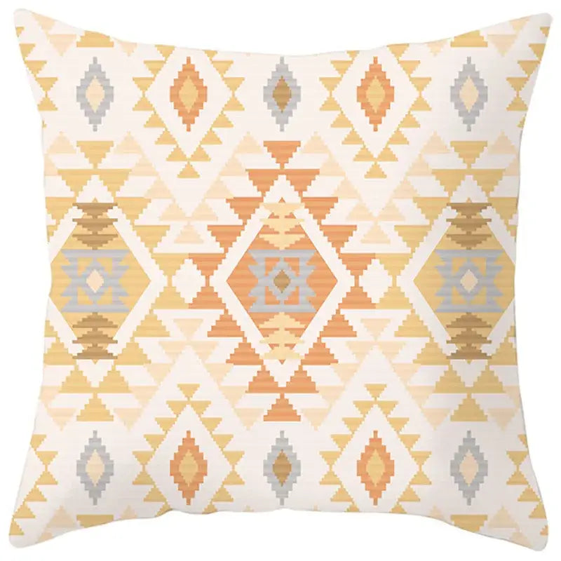 A square pillow cover with ethnic bohemian geometric pattern in beige orange and gray on cream for living room decor