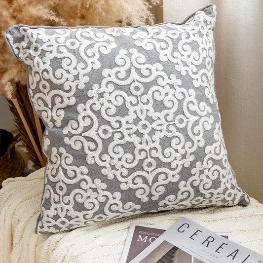 Gray cushion cover with intricate white embroidered swirl ethnic pattern for decorbites ethnic pattern cushion decor