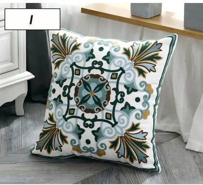 White square pillow cover with intricate embroidered floral and geometric patterns in shades of green blue brown and gold decorbites ethnic style canvas decor