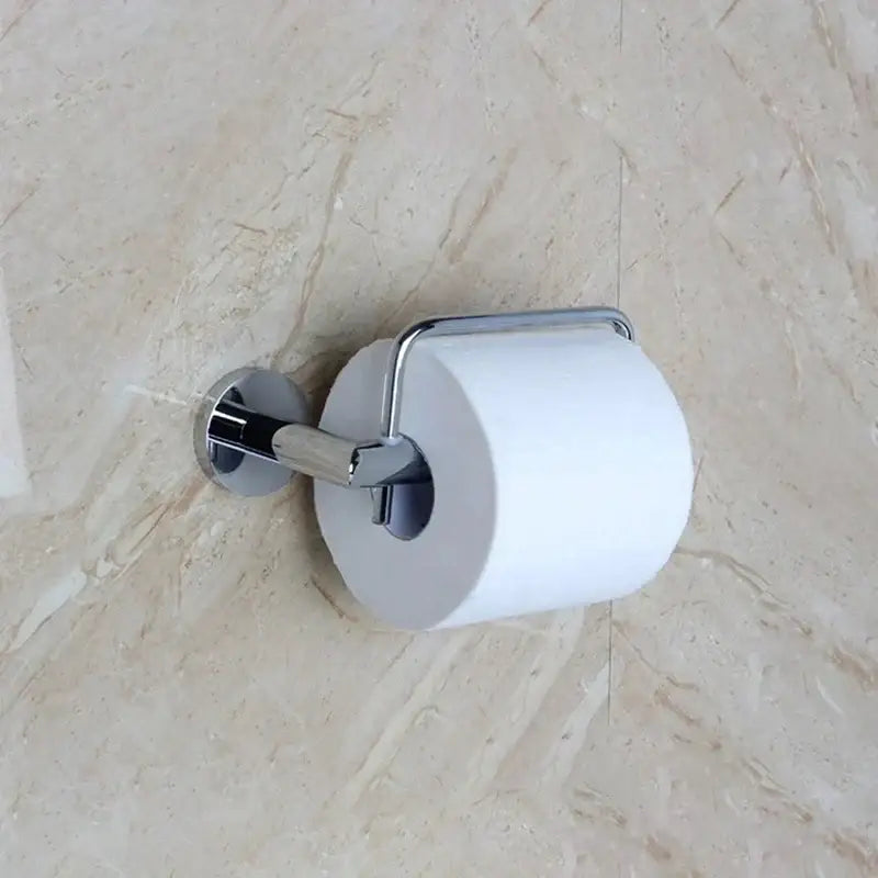 Chrome-finished euro silver bathroom paper holder with sleek modern design holding a standard white roll by decorbites euro silver