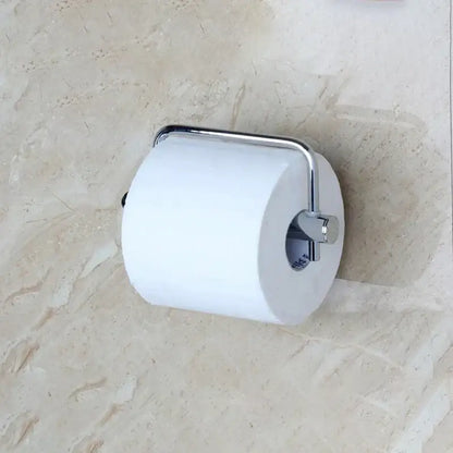 A euro silver chrome paper holder by decorbites featuring a sleek design cradling a white toilet paper roll for euro silver bathroom use