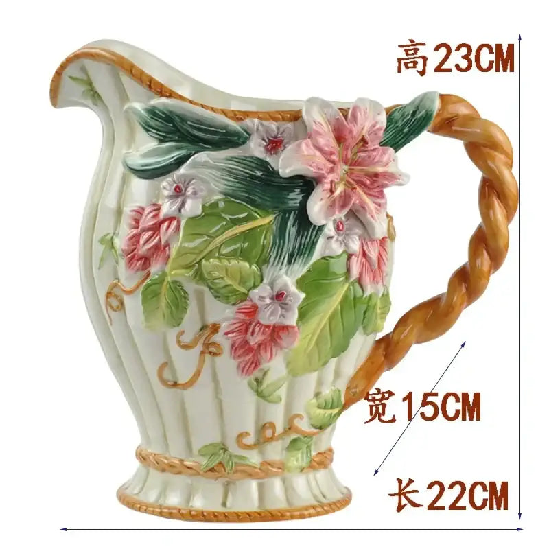White ceramic European floral elephant vase with twisted golden handle and pink green cream relief decorbites elephant vase