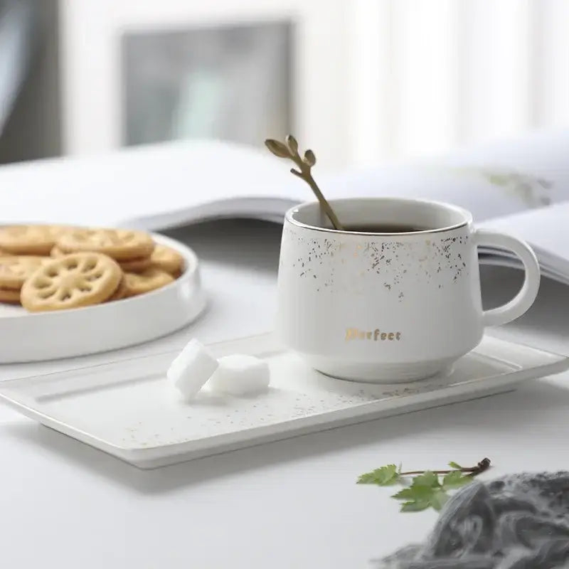 White ceramic coffee cup with gold speckles and perfect inscription from european style ceramic coffee cup set
