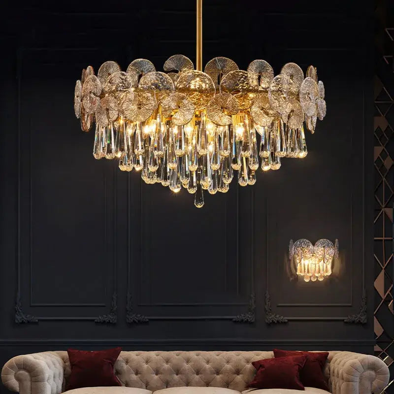 Exquisite golden crystal chandelier with intricate fan-shaped discs and teardrop crystals for living room spaces