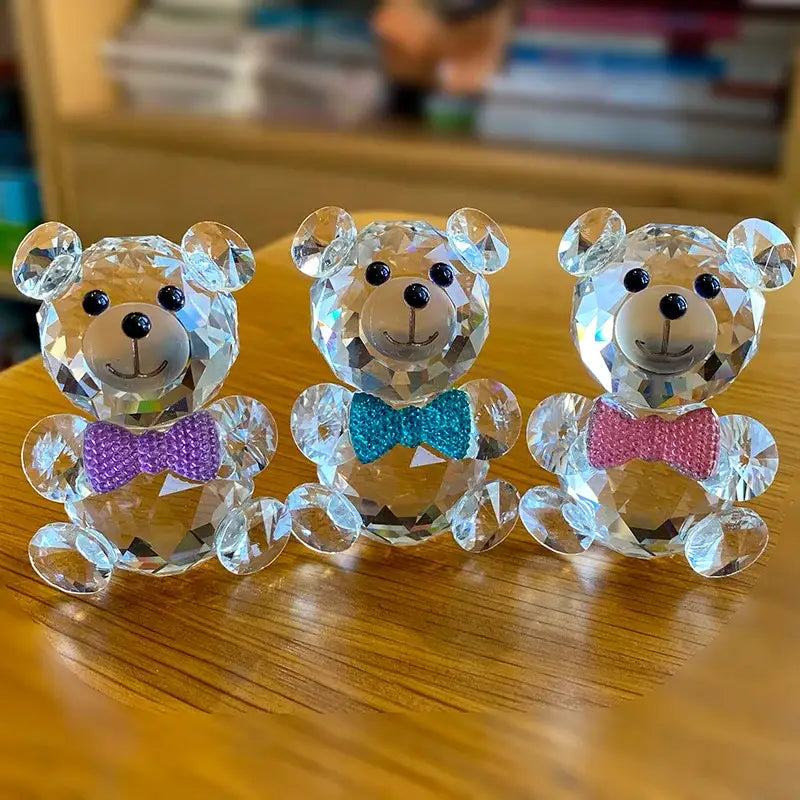 Three faceted clear crystal teddy bear figurines with glittery bow ties in purple teal and pink for bedroom decor