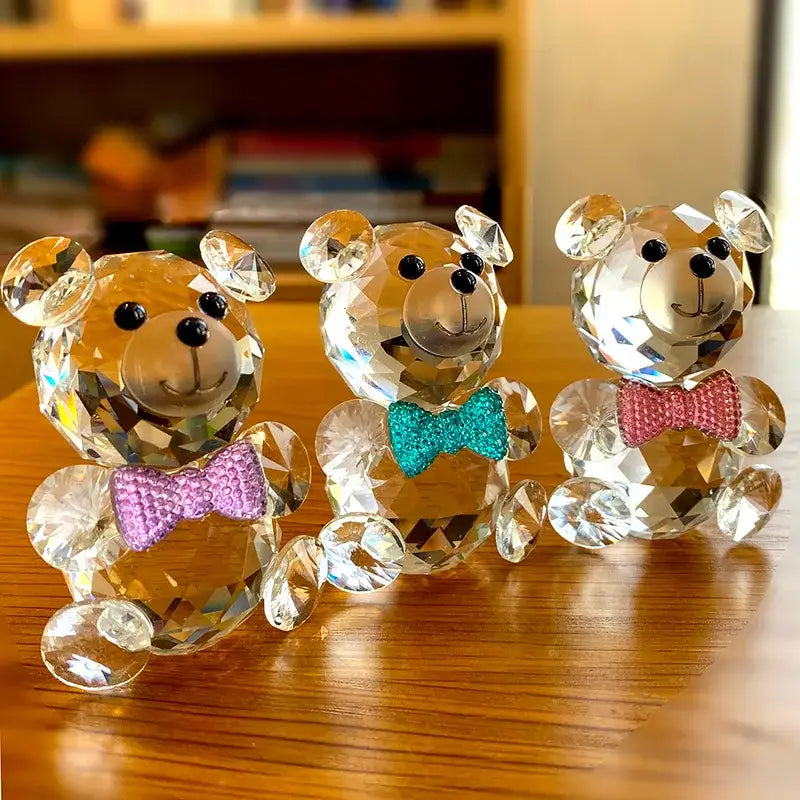 Three faceted clear crystal teddy bear figurines with jeweled bow ties in purple teal and pink for bedroom decor