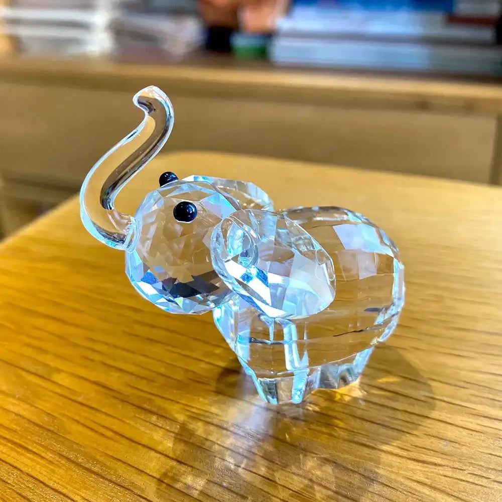 Faceted clear glass elephant figurine with black bead eyes and curved trunk for living room decorbites clear glass decor
