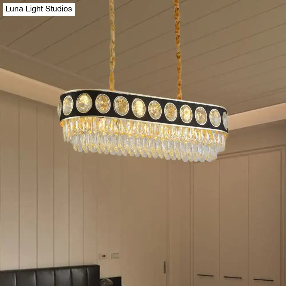 DecorBites™ faceted crystal oval pendant light with black frame gold accents and cascading crystals for dining room island