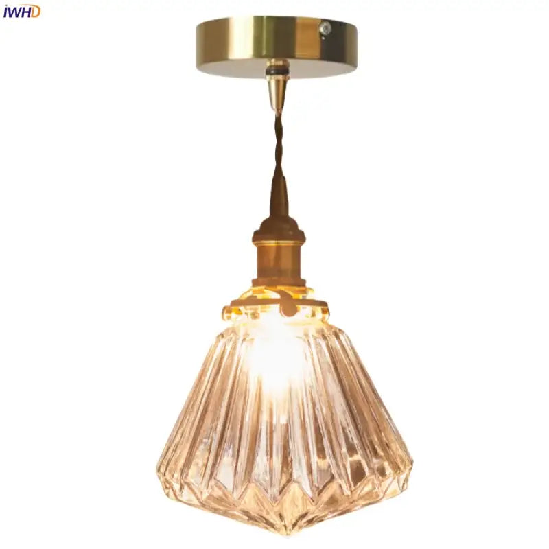 Faceted glass pleats led pendant light with warm tones brass fixture and twisted cord for dining room pendant lights