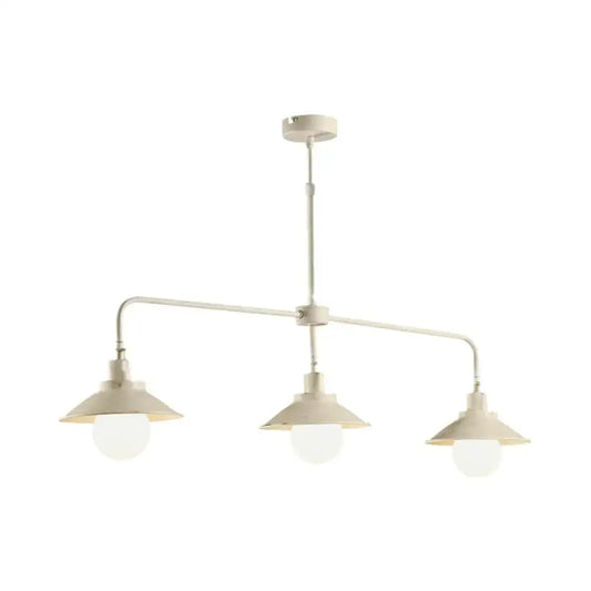 Cream-colored industrial-style pendant light with three conical shades frosted glass bulbs distressed white 110v-120v