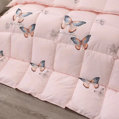 Pink quilted comforter with colorful butterfly pattern made of high-quality white goose down for winter bedding