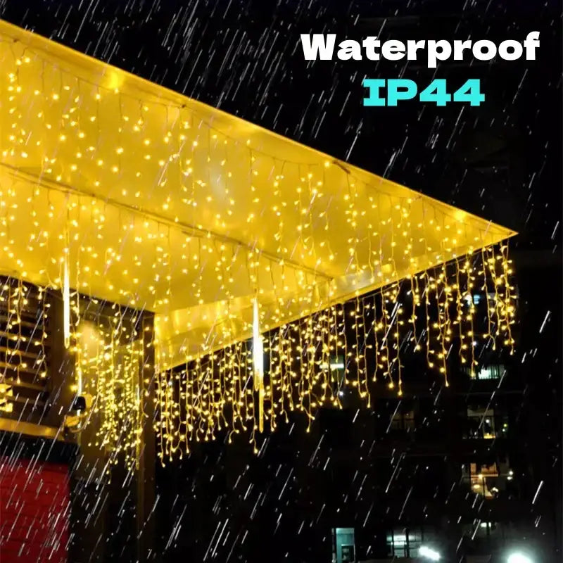 Festive golden led string lights with ip44 waterproof rating hanging in cascading strands for outdoor garden decor