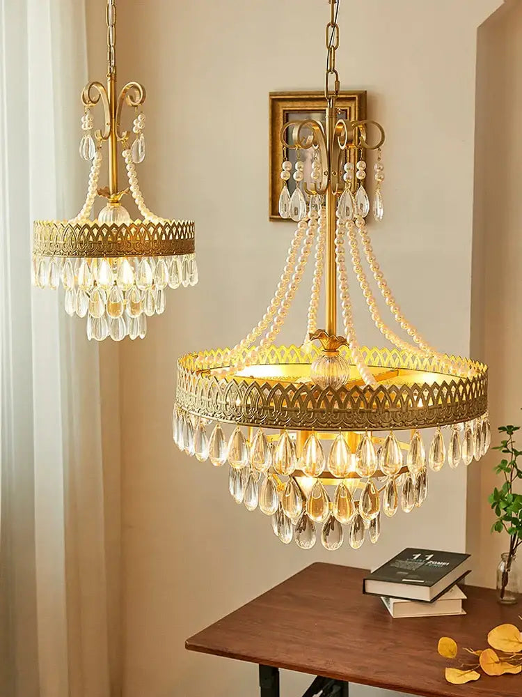 Filigree gold crystal led ceiling chandelier with intricate detailing and cascading teardrops for dining room decorbites crystal led