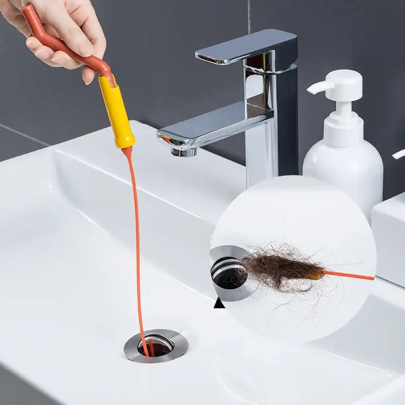 Flexible orange and yellow decorbites drain cleaner brush with long thin cord for kitchen hair removal cleaning