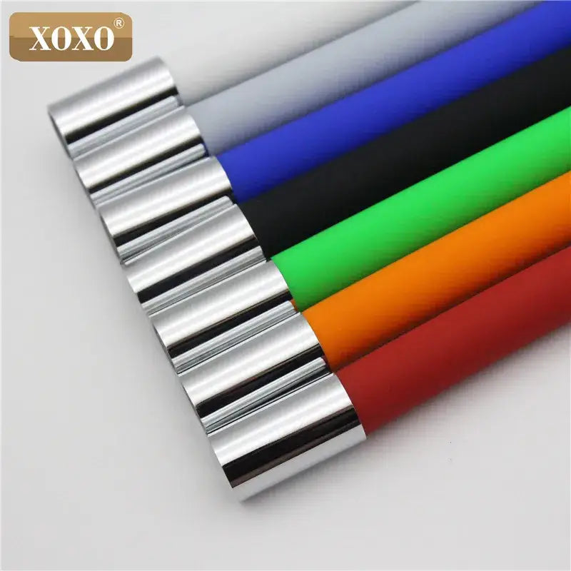 Xoxo brand cylindrical rolls in vibrant colors with metallic silver ends displayed alongside a flexible red silica gel nose kitchen faucet with chrome handle