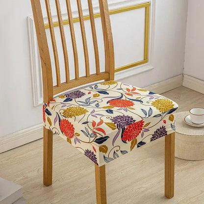 Floral blue and green elastic print chair cover with vibrant cream red yellow and purple floral pattern in stretchy fabric