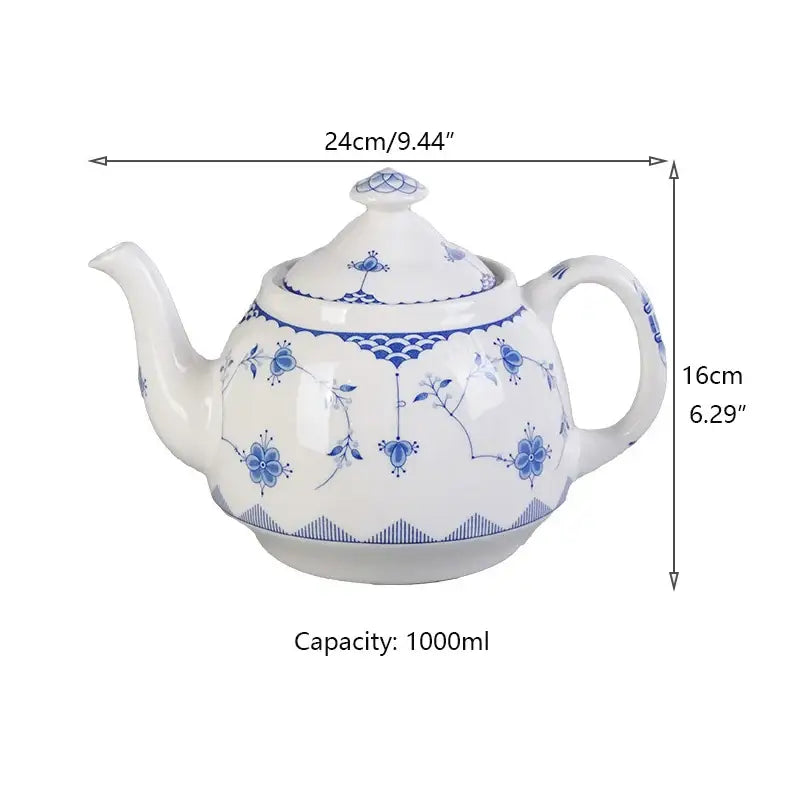 A classic white porcelain teapot with blue floral and wave patterns complements decorbites ceramic dinner plate designs
