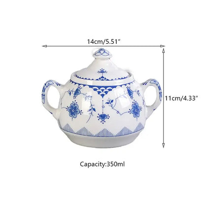 White ceramic sugar bowl with blue floral and geometric patterns and two handles in decorbites ceramic dinner set